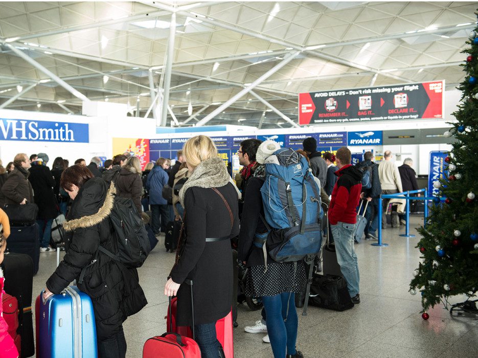 Holiday travel at overcrowded airports. (Photo: © Allsorts Stock Photo / Alamy)