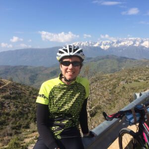 Jackie Marchand, president of Woman Tours, peddles through Albania. (Photo: Courtesy of Woman Tours)