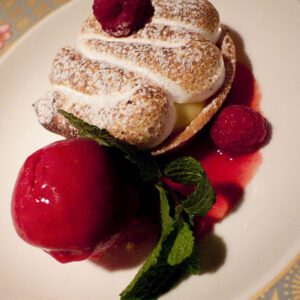 Lemon tart with raspberry sorbet at Brasserie Le Rouge in Stockholm, Sweden. (Photo: FoodSpotting.com)