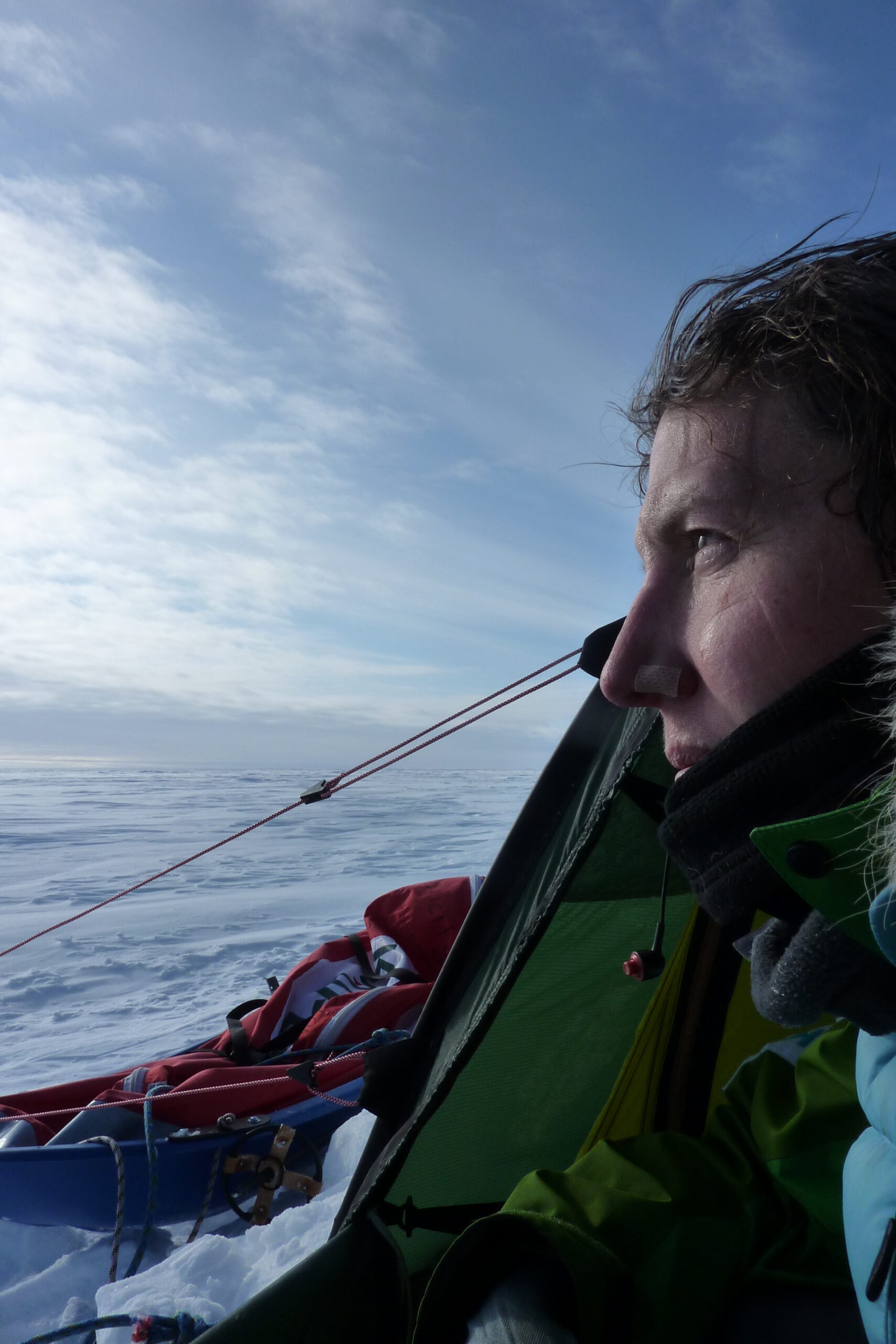 Felicity Aston, the first woman to ski across Antarctica solo, looking at the view from her tent. (Photo: Courtesy of Felicity Aston)