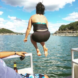 Girl Roamer Poonam Kapoor jumps into the water from our boat on Lake Travis in Texas. (Photo: Super G)