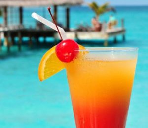 A cocktail on the beach. (Photo: Courtesy of savoredjourneys.com)