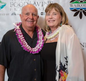 Debi Bishop, right, and husband Tom Hollenbeck, left, at the Hawaii Food and Wine Festival. (Photo Courtesy of Waikoloa Resort)