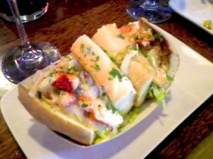 Sink your teeth into this delicious warm Maine Lobster roll with melted garlic butter and fennel that gives it the perfect crunch all wrapped up in a white bread roll at Willi’s Seafood & Raw Bar in Healdsburg, California. (Photo: Super G)