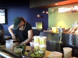 Kayla, expert oyster shucker at Willi’s Seafood & Raw Bar, perfectly prepares our Blue Point and Kumamoto oysters in Healdsburg, California. (Photo: Super G)