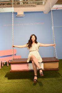 Girl swinging on the ice cream sandwich swing at the Museum of Ice Cream. (Photo: Museum of Ice Cream)