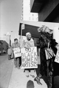 Jan van Raay (American born 1942). Faith Ringgold (right) and Michele Wallace (middle) at Art Workers Coalition Protest, Whitney Museum, 1971. (Photo: Jan van Raay)