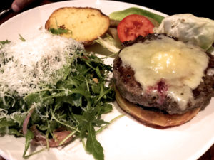 Photo Caption: The Firehouse Cheeseburger with an arugula salad at the Firehouse No. 1 Gastropub in San Jose, California. (Photo: Super G)