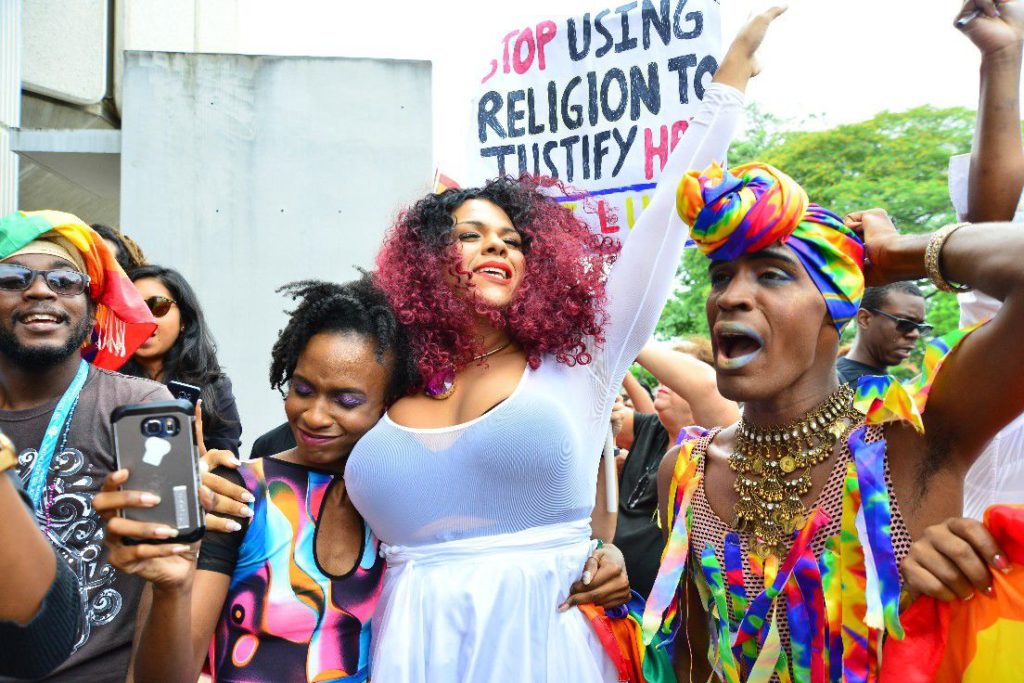 Members of the LGBT community celebrates the verdict in Jason Jones case striking down the “unconstitutional” buggery law, Hall of Justice, Port of Spain last Thursday